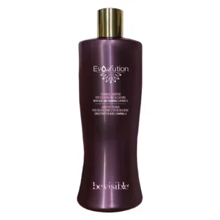 Evoilution: Technical additive for coloring and bleaching with aloe and chamomile extracts in a sleek purple bottle.