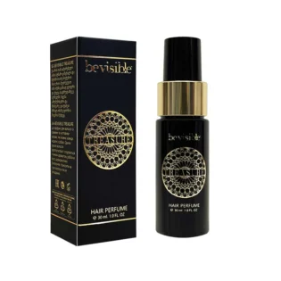 Treasure Hair perfume in sleek black bottle with gold accents, presented with matching box featuring intricate design and product details.